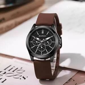 Detail view of quartz watch with black dial and sub-dials on brown silicone strap