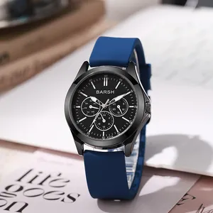 Detailed macro view of a men's sports watch with a navy blue silicone strap and black dial