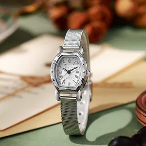 Detail of tonneau-shaped ladies watch with silver mesh band and Roman numeral dial
