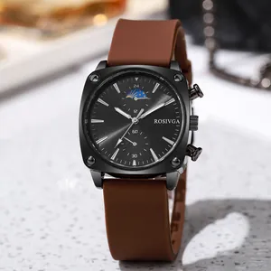 Detailed close-up of a square black metal watch case with moon phase and brown strap