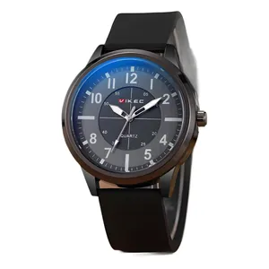 Fashionable men's quartz watch with large grey dial and black silicone strap on white background