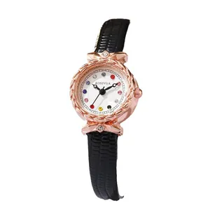 Elegant rose gold round watch with colorful crystals and black embossed leather strap