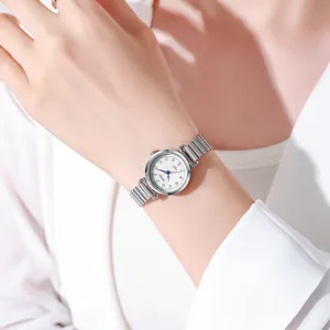 Elegant women's silver stainless steel quartz watch with small white dial and blue hands