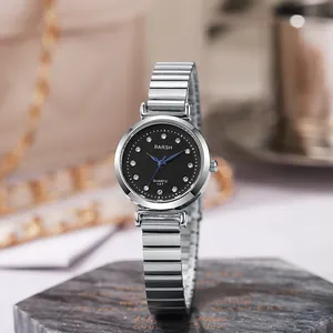 Detail shot of a Barsh women's quartz watch with black rhinestone dial on marble