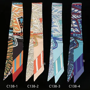 Bohemian silk-style twilly scarves with geometric leaf prints in four distinct colors