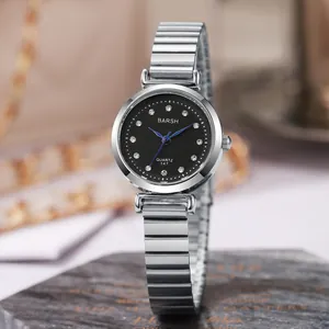 Elegant silver steel women's quartz watch with black rhinestone dial on marble base