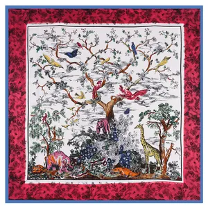 Detailed close-up of large twill silk scarf featuring forest animals and tree of life