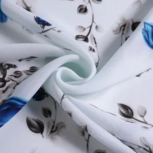 Silk-like satin square scarf with artistic blue rose print on elegant white fabric