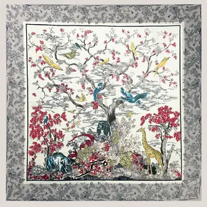 Close-up of Toile de Jouy silk scarf featuring a detailed tree of life and exotic animals