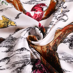 Macro shot of forest birds and landscape print on smooth twill silk scarf fabric