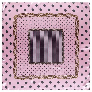 Pink silk square scarf with classic black polka dots and gold chain pattern on white background