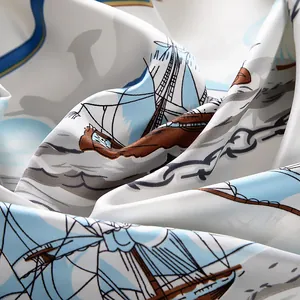 Detail of nautical sailing boat print on premium white satin scarf with rope patterns