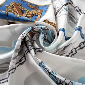 Detail showing high-quality rolled edges and nautical print on silk square scarf