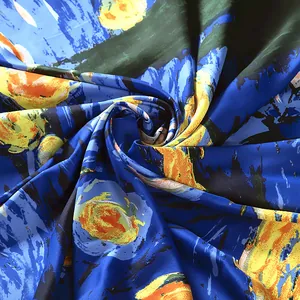 Detailed shot of Van Gogh Starry Night silk scarf showing satin texture and oil painting swirls