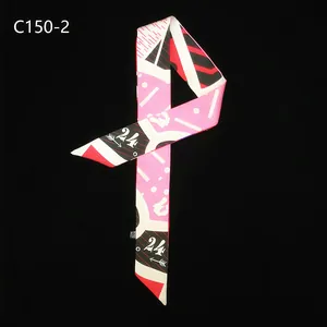 Narrow silk twilly scarf with geometric patterns and numbers on a black background