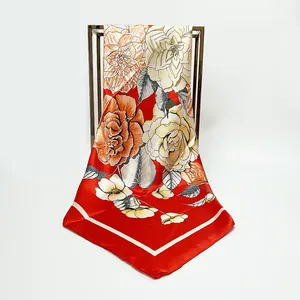 Red 90cm square silk satin scarf featuring large floral lily and rose patterns