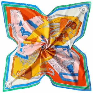 Detail of a large silk-like square scarf featuring vintage rope and medal patterns