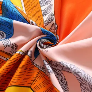 Macro shot of colorful silk scarf showing silky twill texture and rope pattern