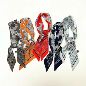 Silk twilly scarf with zebra print and polka dots, elegant narrow neck ribbon for bags
