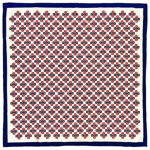 Classic 90cm square silk scarf with geometric pattern and navy blue border in flat lay