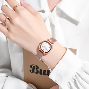 Women's rose gold square watch with a mesh steel strap and white minimalist dial face