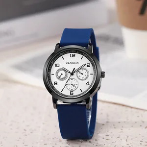 Detailed close-up of navy silicone strap and quartz watch face with chronograph subdials