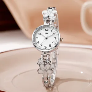 Elegant women's silver quartz watch with white floral enamel bracelet and crystal details