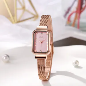 Close-up of rose gold mesh band and rectangular pink dial fashion ladies watch