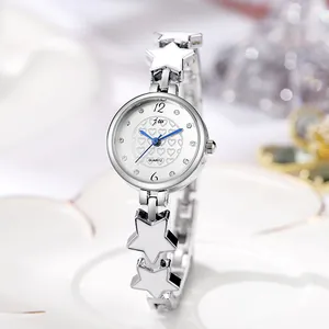 Macro view of silver star-linked watch bracelet with heart pattern dial and rhinestones