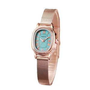 Elegant rose gold oval women's watch with turquoise blue dial and Milanese mesh band
