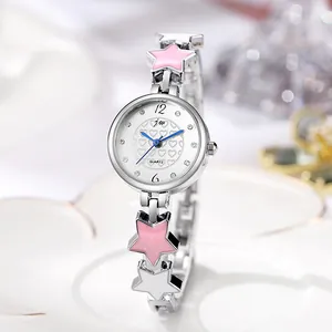 Detail of silver alloy watch band with star enamel charms and blue needle clock dial