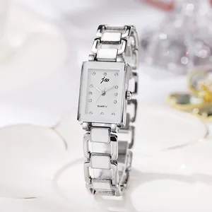 Elegante quadratische Quarz-Damenuhr in Silber mit weißen Emaille-Gliedern und Diamanten