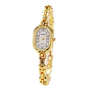 Retro-Damenuhr in Gold mit ovalem Zifferblatt, Perlmutt-Design und Quarz-Uhrwerk