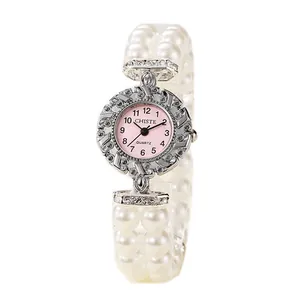 Elegante orologio da donna al quarzo con cinturino di perle e ghiera con diamanti