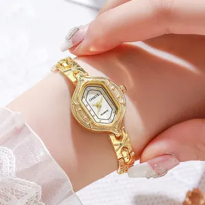 Elegant gold vintage quartz bracelet watch with octagon face and embossed floral details