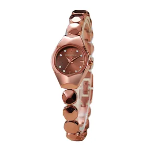 Elegant rose gold women's watch with diamond-set dial and geometric metal bracelet link