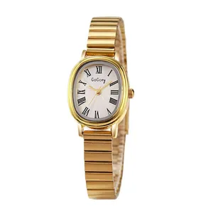 Elegant gold oval quartz watch for women with expansion band and Roman numeral dial