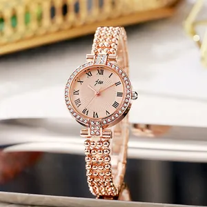Elegant rose gold women's watch with Roman numerals and diamond-encrusted bezel