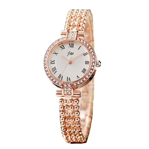 Elegant rose gold women's watch with rhinestone bezel and beaded metal bracelet strap