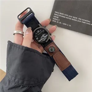 Tactisch kwartshorloge met zwarte wijzerplaat, blauwe nylon band en kompas detail