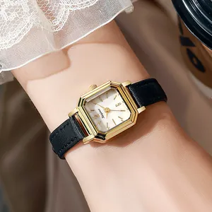 Mini rectangular gold watch for women with white dial and slim black leather strap