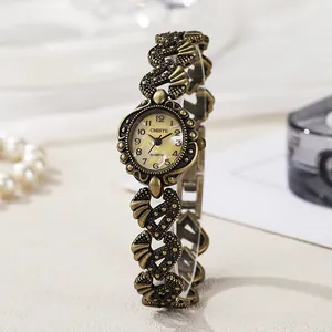 Vintage Women's Quartz Bracelet Watch Elegant Hollow Heart Carved Alloy Strap Minimalist Gold Bronze Tone Analog Wristwatch For Lady