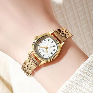 Montre élégante pour femme en or avec cadran romain blanc et bracelet en acier