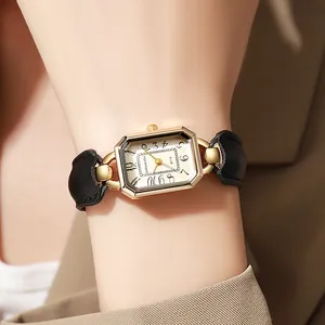 Elegante rechteckige goldene Quarzuhr mit schwarzem Lederarmband für Damen von DOUKOU