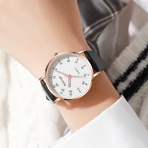 Minimalist quartz watch with rose gold case and white military scale dial on leather strap