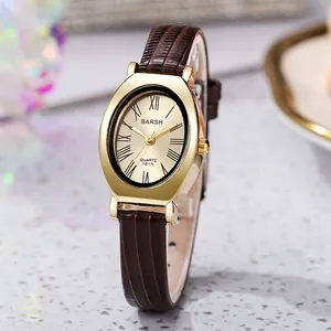 Elegant gold oval quartz watch with brown crocodile embossed leather strap and Roman numerals