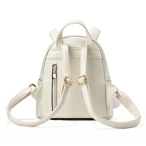 Japanese style white PU leather mini backpack with bunny ears and pom-pom charm