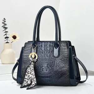 Deep blue faux crocodile leather handbag with double handles and leopard print silk scarf