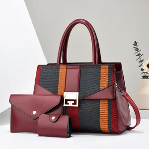 Three-piece women bag set in burgundy nylon and woven fabric with golden buckle