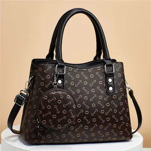 Sac seau vintage marron avec imprimé logo, pochette interne et petit porte-monnaie rond